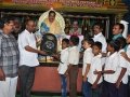 Dr.Umar Alisha, UARDT chairman, ​distributing school bags to 125 students ( 3rd class to 10th class)of R.R.BH.R BC boys hostel pithapuram on the occasion of Guru Pournami at Sri Viswa Vizanan Aadhyatmika Peetham new Ashram Premises